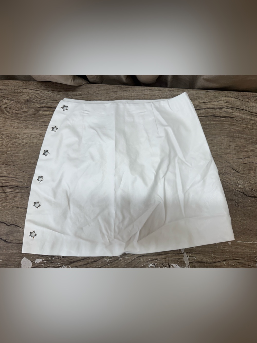 H:OURS white faux leather white mini skirt with star grommets size large NWT